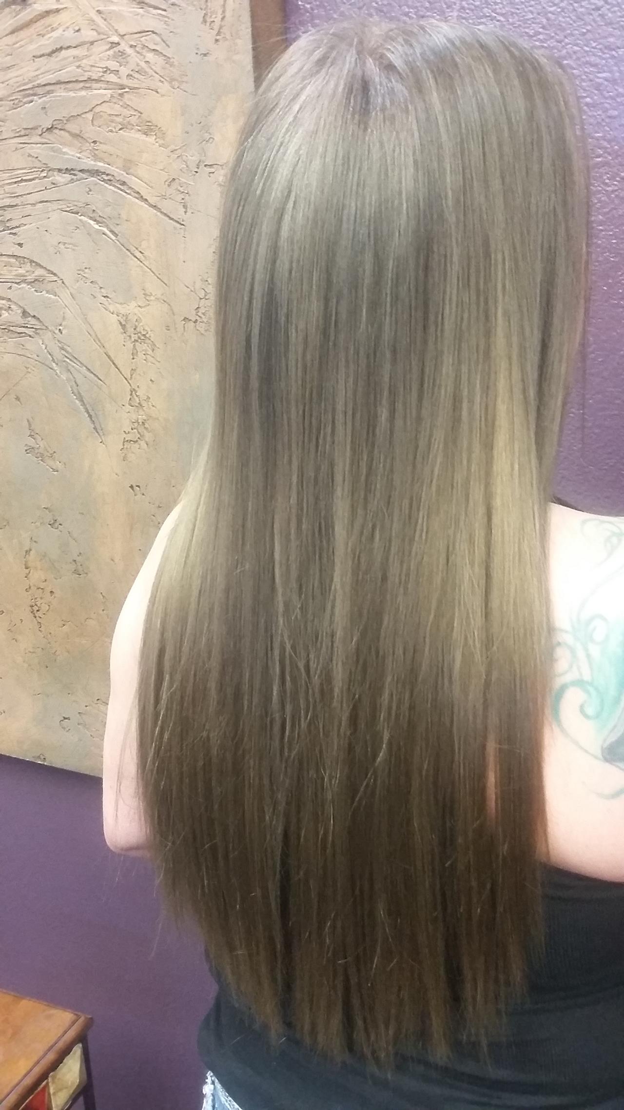 2 rows of silky straight, hand tied hair extensions.