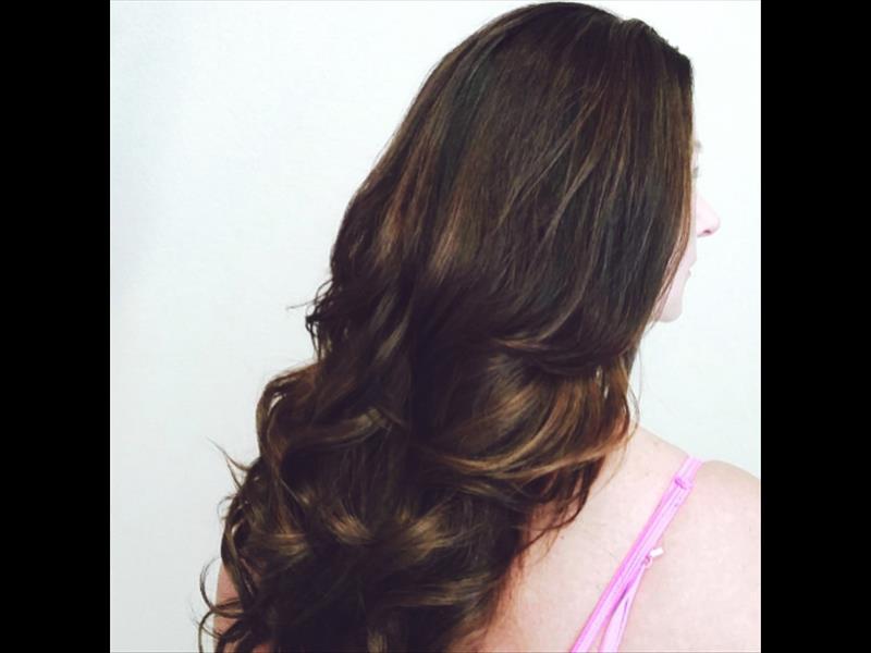 Tape-In hair extensions.