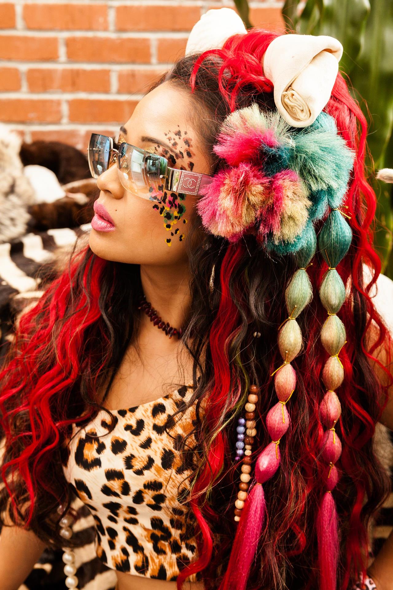 Hair Extensions, Color, Costume and Styling combine into The belle of the BedRock Ball, Pebblz.